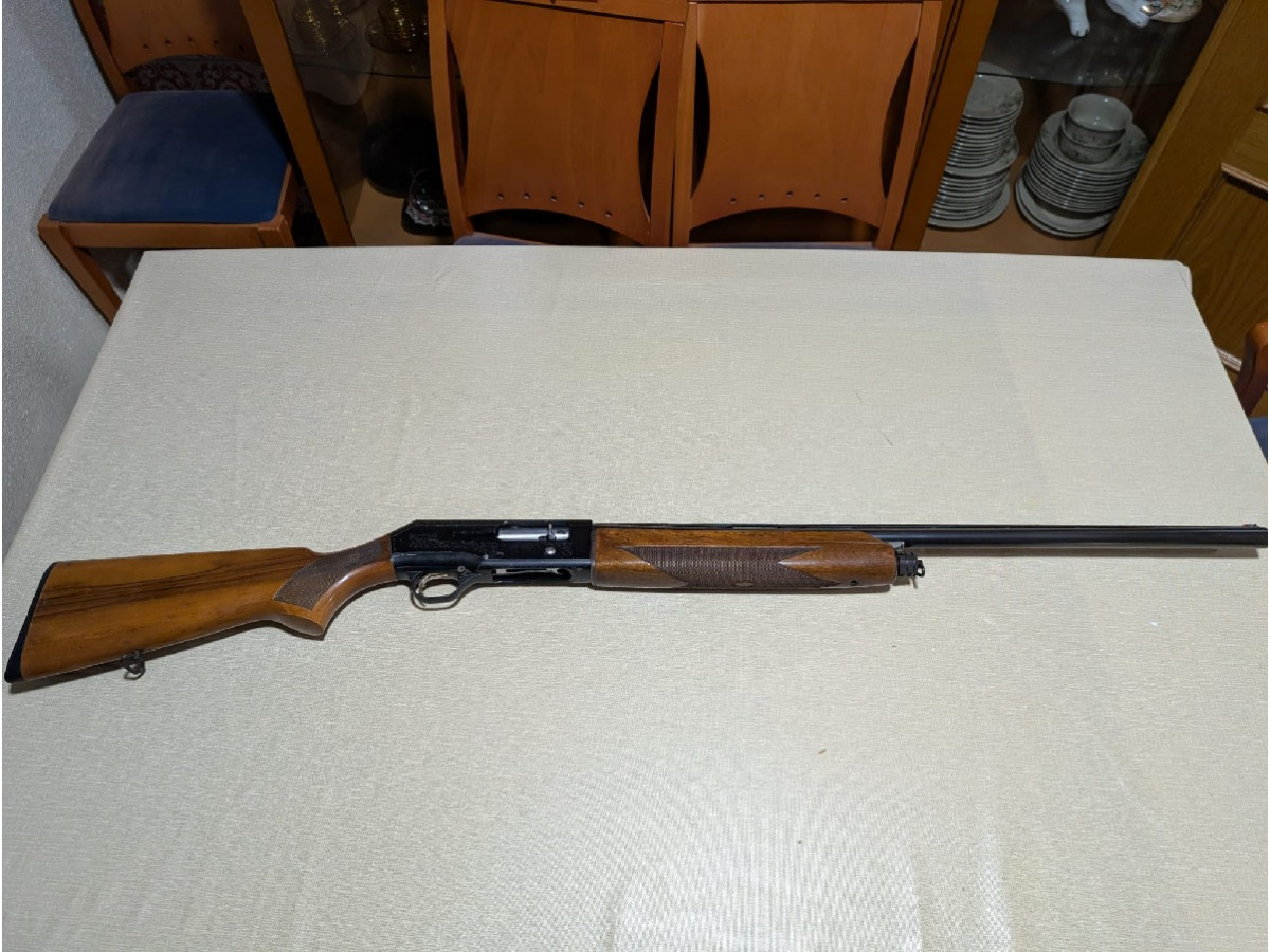 Escopeta repetidora Beretta 304