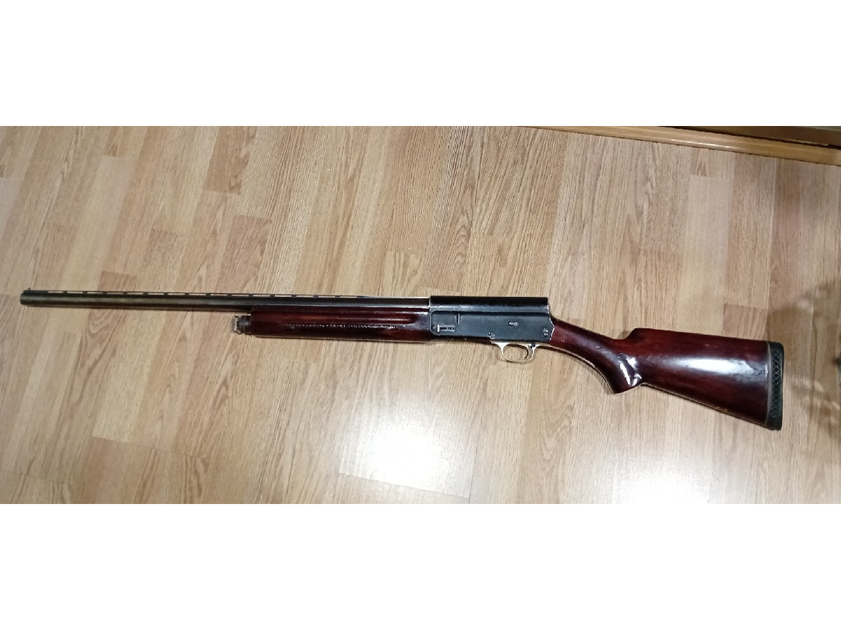 Escopeta Repetidora FN