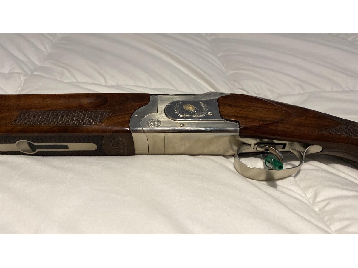 Escopeta superpuesta zurdos