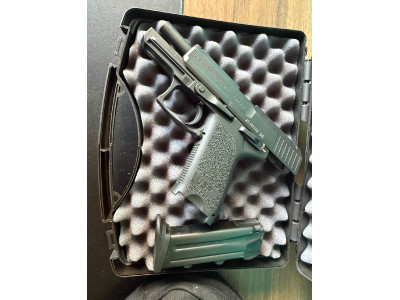 Arma corta HK USP Compact