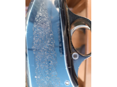 Beretta del 12 con funda