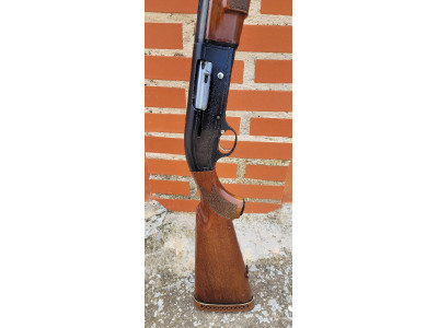 Escopeta Repetidora Beretta 303