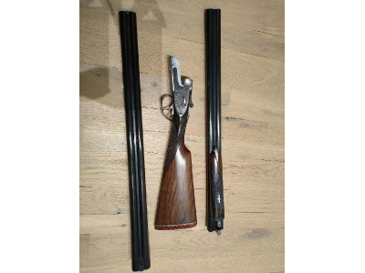 Aya con dos cañones