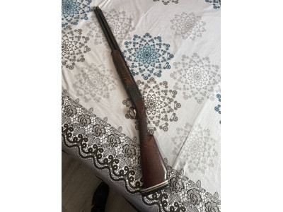 Escopeta calibre 12 gamba superpuesta