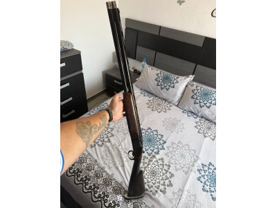 Escopeta calibre 12 gamba superpuesta