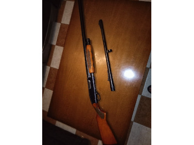 Escopeta corredera ......