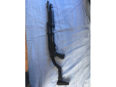 Escopeta corredera  Stinger