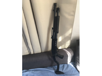 Escopeta corredera  Stinger