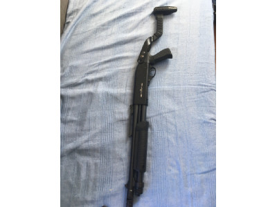 Escopeta corredera  Stinger