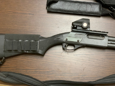 Escopeta corredera Remington