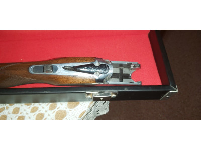 Escopeta de tiro al plato.