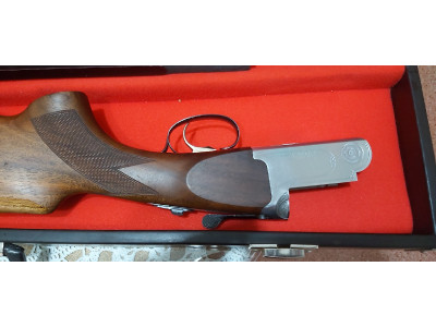 Escopeta de tiro al plato.