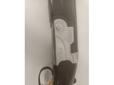 Escopeta marca Breda superpuesta