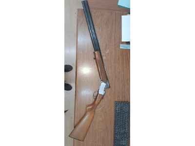 Escopeta marca investra superpuesta. calibre 12. recámara má