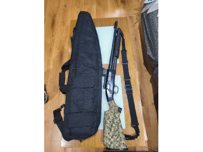 Escopeta mossberg maverick