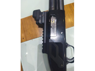 Escopeta mossberg maverick