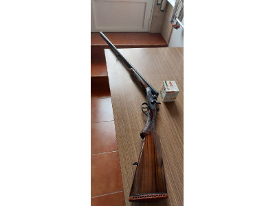 Escopeta paralela fina de perrillos