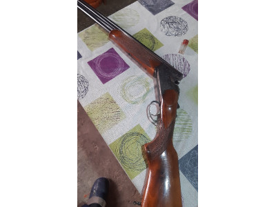 Escopeta superpuesta monogatillo