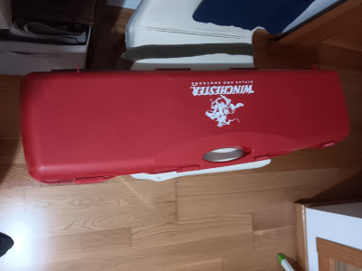 Escopeta Winchester superpuesta