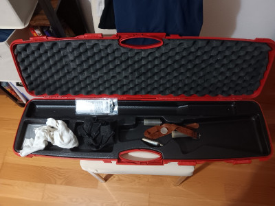 Escopeta Winchester superpuesta