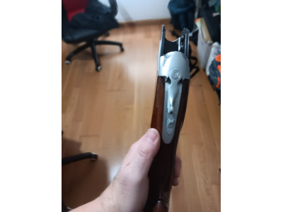 Escopeta Winchester superpuesta