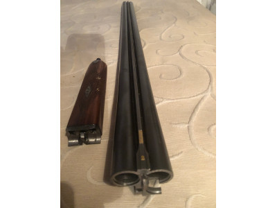 PAREJA DE ESCOPETAS AYA, CON ESTUCHE Y FUNDAS DE CUERO