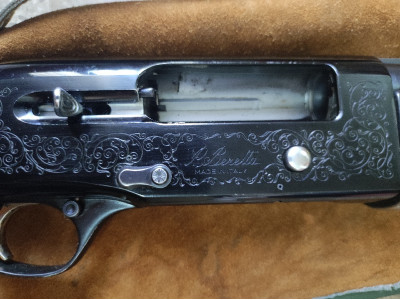 Repetidora Beretta con correa y funda,con muy pocos tiros