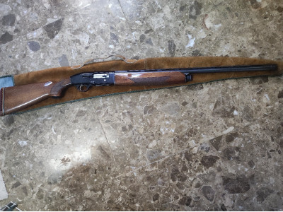 Repetidora Beretta con correa y funda,con muy pocos tiros