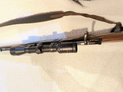 Rifle con visor impecable