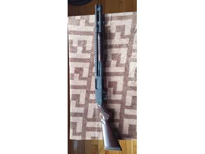 Escopeta de corredera Mossberg 590 Cal. 12