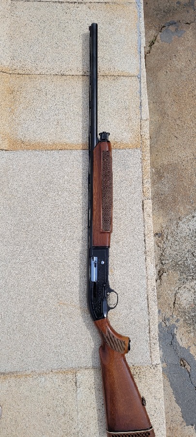 Escopeta Repetidora Beretta 303