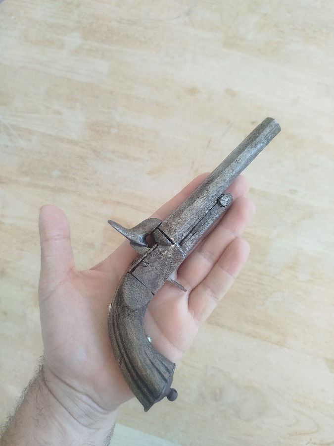 Pistola antigua 1.800